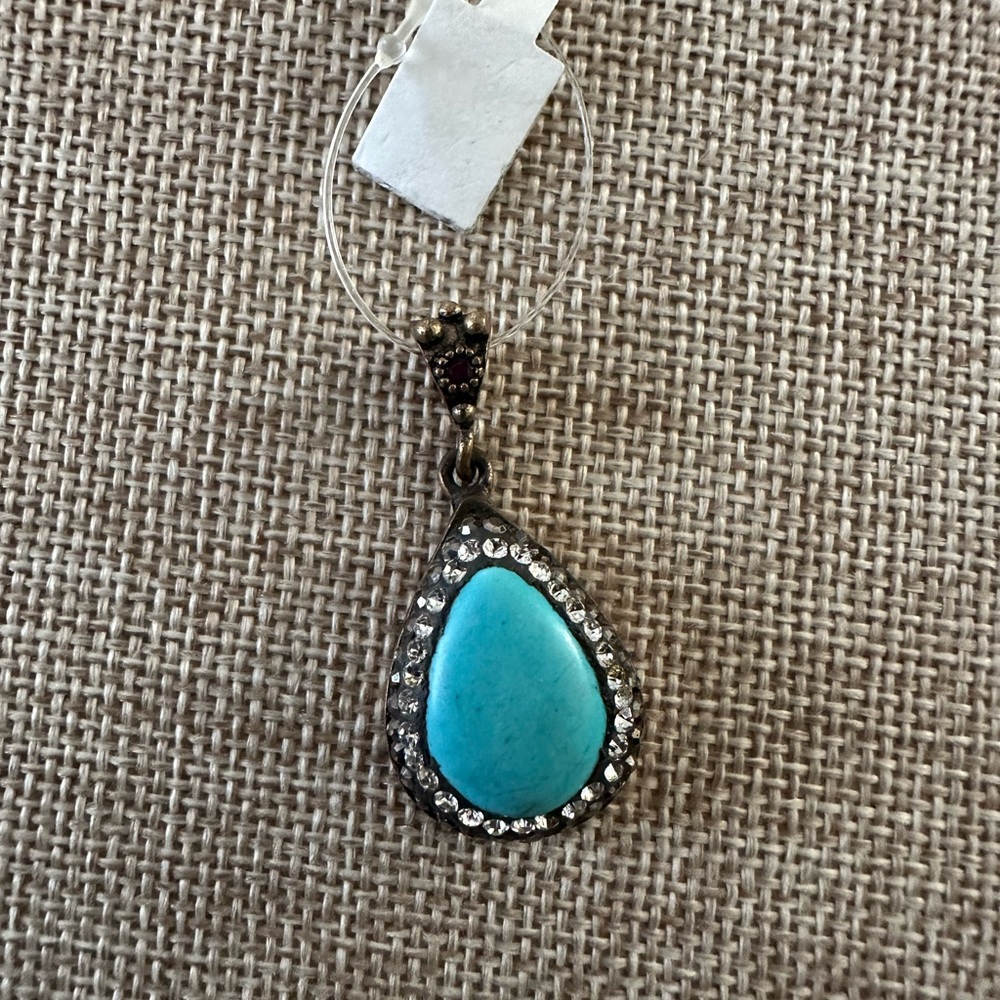Turquoise Teardrop Pendant Necklace set on sterling silver and brass clasp